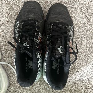 New Balance Black, White, and Seafoam Athletic Shoes